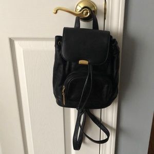 Small black backpack. Genuine leather.